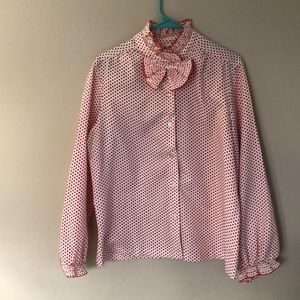 Red and white polka dot blouse